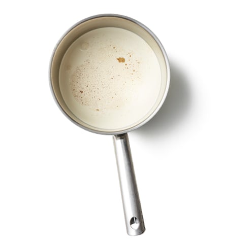 Felicity Cloake masterclass lemon posset – step 5. Mix the cream and spices. Pour the cream into a medium pan, preferably a fairly heavy-based or nonstick one, and add the spices. Step 6: Heat the cream and spices. Gently heat the cream until it’s barely simmering, then take off the heat. Pour in the warm lemon syrup, whisking to combine.