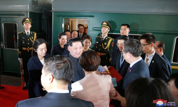 North Korean leader Kim Jong-un and his wife on an unofficial visit to China in March