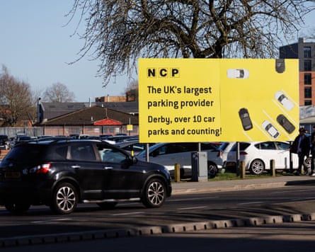 A car passes by an NCP car park in Derby, England