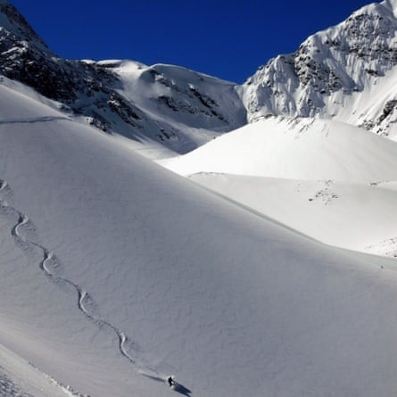 skiing a steep pristine slope