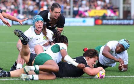 New Zealand’s Kaipo Olsen-Baker scores a try against South Africa.