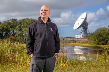 Ian Jones at Goonhilly Earth Station in Cornwall, with the ‘Merlin’ antenna in the background.