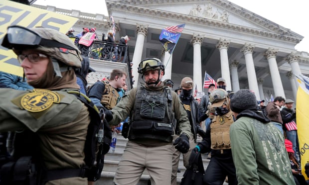 Oath Keepers members at the Capitol on 6 January. The post-Capitol attack membership surge is evident in payment records from the Oath Keepers website.