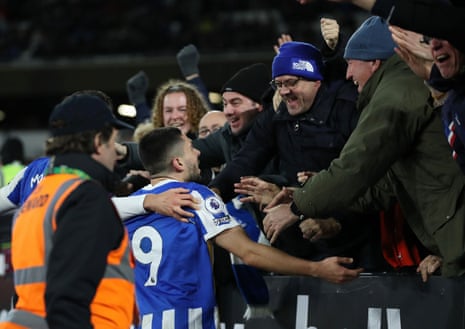 Brighton’s Neal Maupay celebrates scoring their equaliser with fans.
