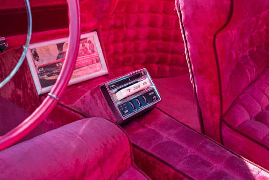 pink car interior with tape deck