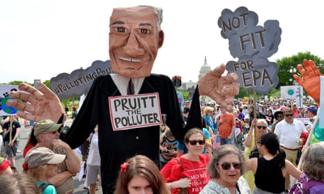Demonstrators carry a giant puppet depicting Scott Pruitt during the People’s Climate March last month.