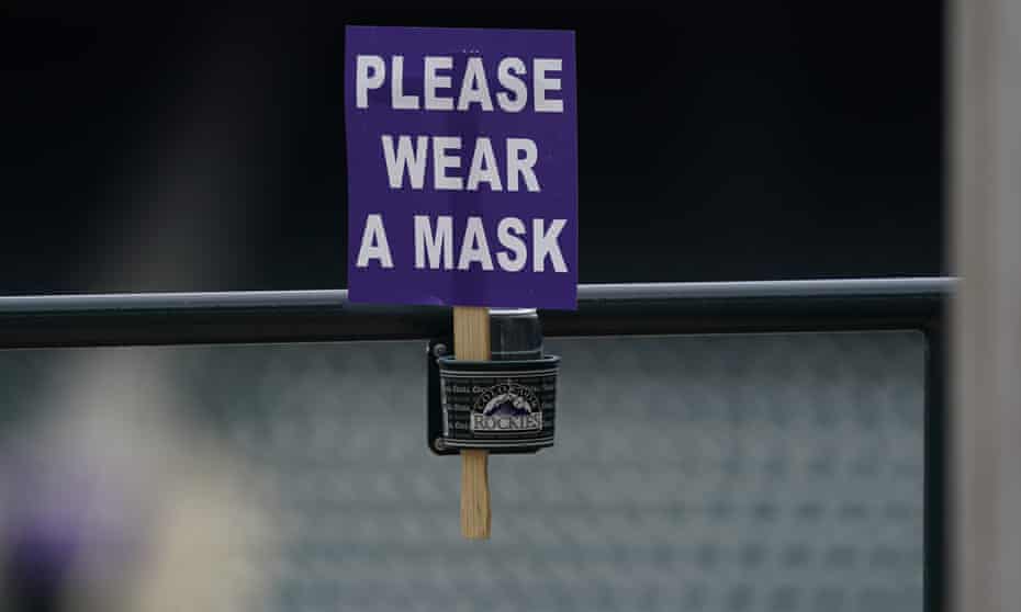 A sign on the third deck in Coors Field before the Colorado Rockies host the Cincinnati Reds in a baseball game on 13 May in Denver.