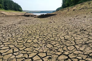 The dried-out bed of Thruscross reservoir in Harrogate, North Yorkshire