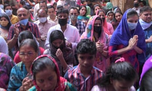 Hindu devotees offer prayers during ‘Navratri’ at the Mata Longa Wali Devi temple in Amritsar.