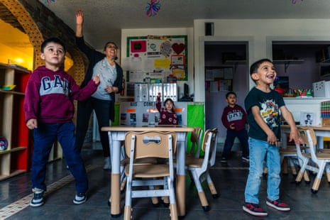 children and a women jumping