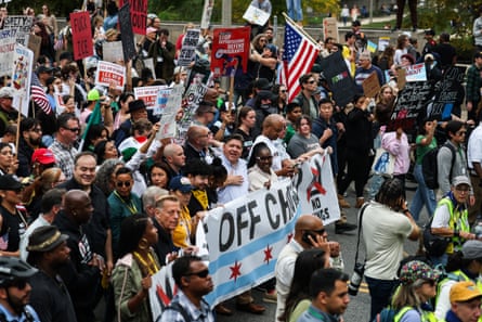 people walk during a protest