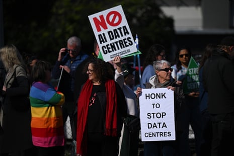 Protesters hold signs reading "No AI Data Centres" and "Honk To Stop Data Centres" in Melbourne