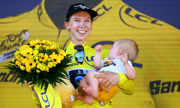 Lorena Wiebes celebrates on the podium after taking the yellow jersey. ‘It’s really special that the Tour de France is back for women,’ she said.