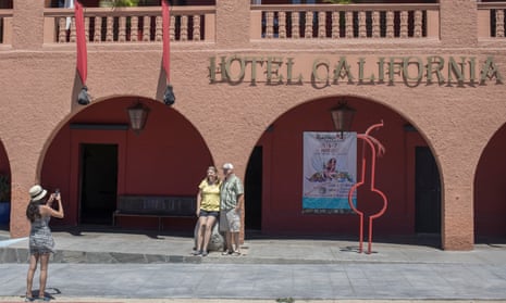 Tourists outside Hotel California in the town of Todos Santos, Mexico.