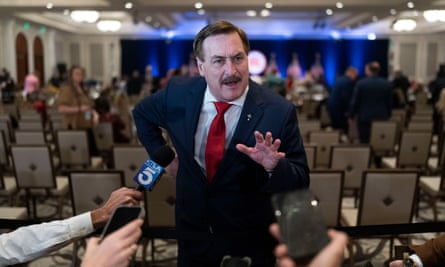 MyPillow chief executive Mike Lindell talks to reporters at the Republican National Committee meeting in Dana Point, California.