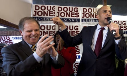 Doug Jones with Democratic senator Cory Booker on Saturday.