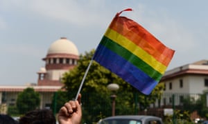 A flag is held by an activist outside the supreme court.