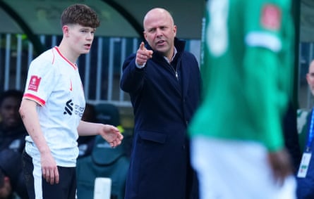 Arne Slot issues instructions to midfielder James McConnell, one of 10 outfield changes, during Liverpool’s shock FA Cup fourth-round defeat to Plymouth last season