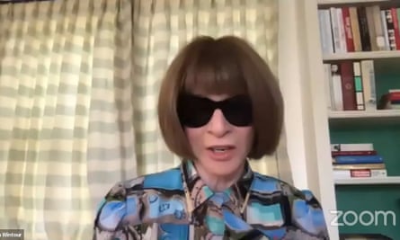 Anna Wintour with dark glasses and drawn curtains in Vogue Global Conversations.