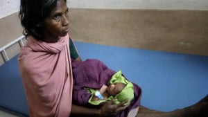 Baby in Gudalur wearing a Bempu bracelet.