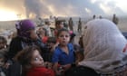 Thousands flee Mosul to Syrian refugee camps