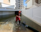 Severe flooding in eastern Spain, while UK hit by first named storm of winter