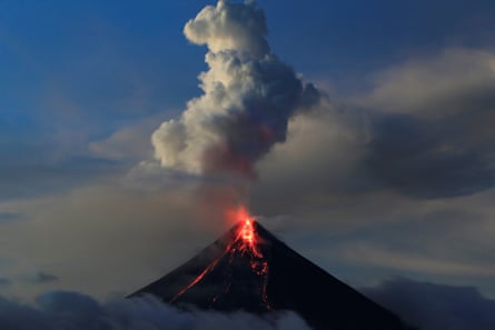 Lava flows from the crater of Mount Mayon volcano