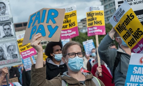 NHS staff march in London in July to demand fair pay