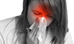 Woman with flu sneezing