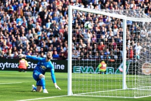 September 29: David De Gea of Manchester United watches the ball as a shot by Andriy Yarmolenko of West Ham United is deflected into the net.