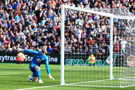 September 29: David De Gea of Manchester United watches the ball as a shot by Andriy Yarmolenko of West Ham United is deflected into the net.