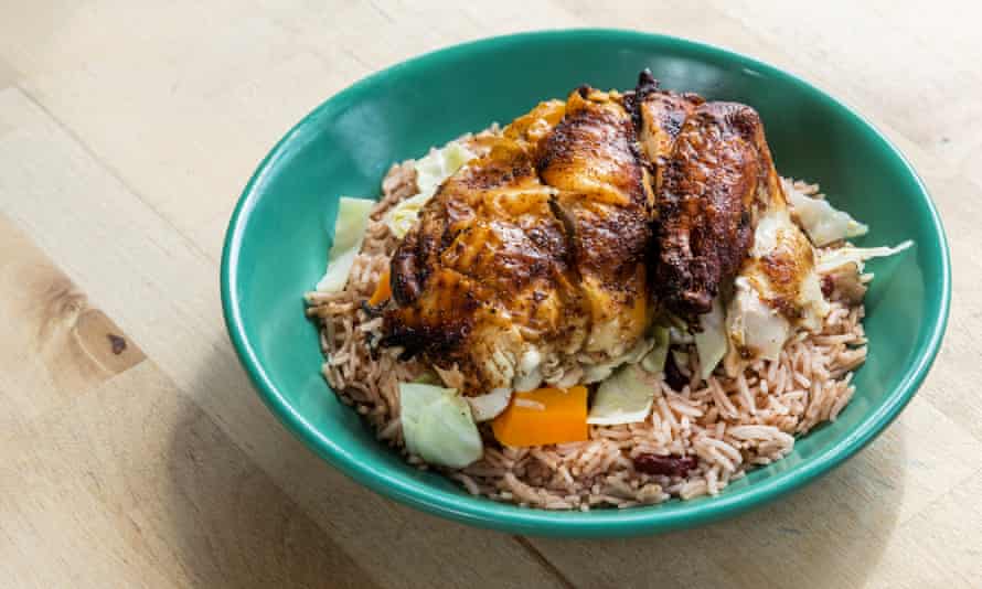 Barbecue jerk chicken with rice and peas at Buzzrocks restaurant in Mancester