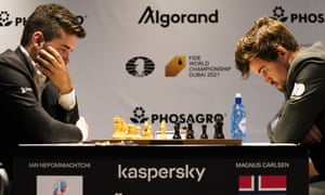 Ian Nepomniachtchi of Russia, left, and Magnus Carlsen of Norway compete during the FIDE world championship in Dubai, United Arab Emirates, on 10 December
