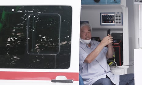 Jun Kwang-hun, the leader of Sarang Jeil church in Seoul, leaves his house in an ambulance on Monday 17 August.