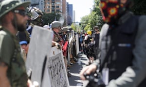 Rightwing and leftwing protesters battle with mace, paint balls and rocks near Justice Center in downtown Portland Saturday, 22 August 2020.