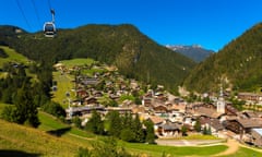 La Clusaz in summer with church tower and cable car