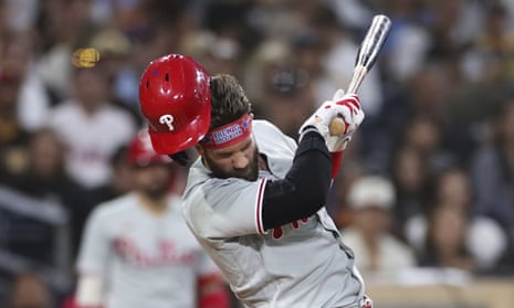Philadelphia Phillies' Bryce Harper reacts after being hit by the pitch from San Diego Padres' Blake Snell that broke his thumb