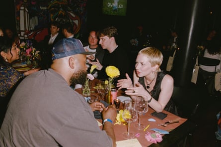 people talk at a dinner party