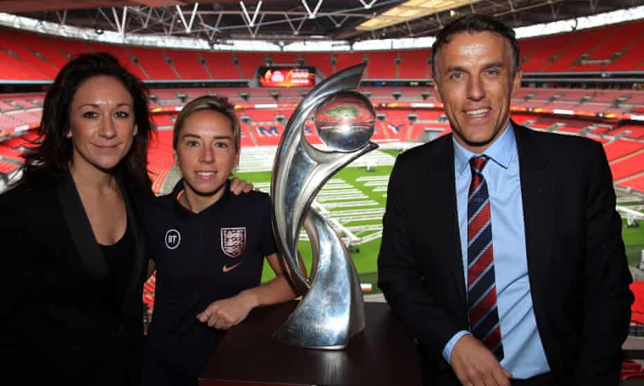 Uefa’s head of women’s football, Nadine Kessler (left), England international Jordan Nobbs (centre) and England manager Phil Neville with the women’s Euro trophy.