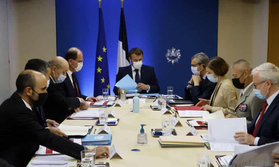 Emmanuel Macron leading a national security meeting on Thursday to discuss the Pegasus project revelations.