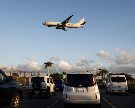 A US navy jet lands at Kadena Air Base in Kadena, Okinawa prefecture, Japan