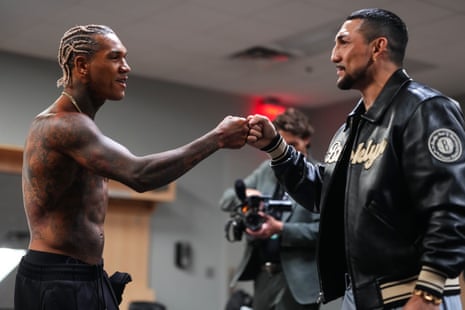 Conor Benn talks with Teófimo López backstage in the buildup to the main event at T-Mobile Arena.