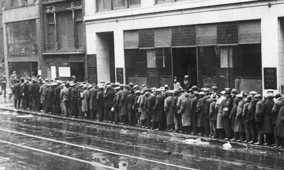 Unemployed New Yorkers queue for bread and handouts during the 1930s Great Depression.