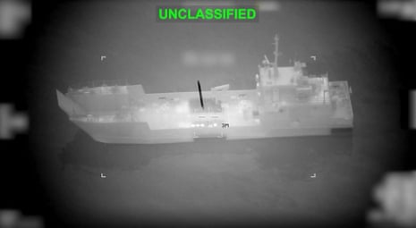 Video released by the US Central Command shows what they say is an Iranian naval vessel as it is struck by a projectile ‘near the Strait of Hormuz'.
