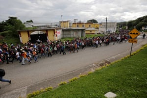 Honduran migrants, part of a caravan trying to reach the U.S., are seen during a new leg of their travel in Esquipulas, Guatemala.