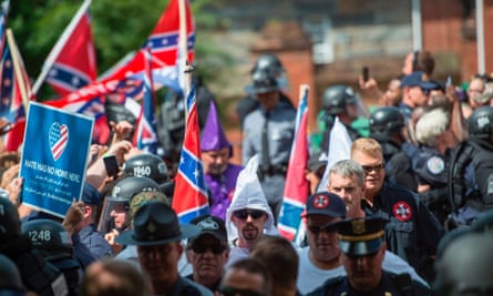 Members of the Ku Klux Klan and others arriving for a rally, calling for the protection of Southern Confederate monuments, in Charlottesville, Virginia on 8 July 2017.