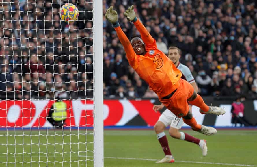 Edouard Mendy dives but cannot stop a cross from Athur Masuaku giving West Ham a 3-2 victory during the Premier League match between West Ham United and Chelsea at the London Stadium on December 4th 2021.