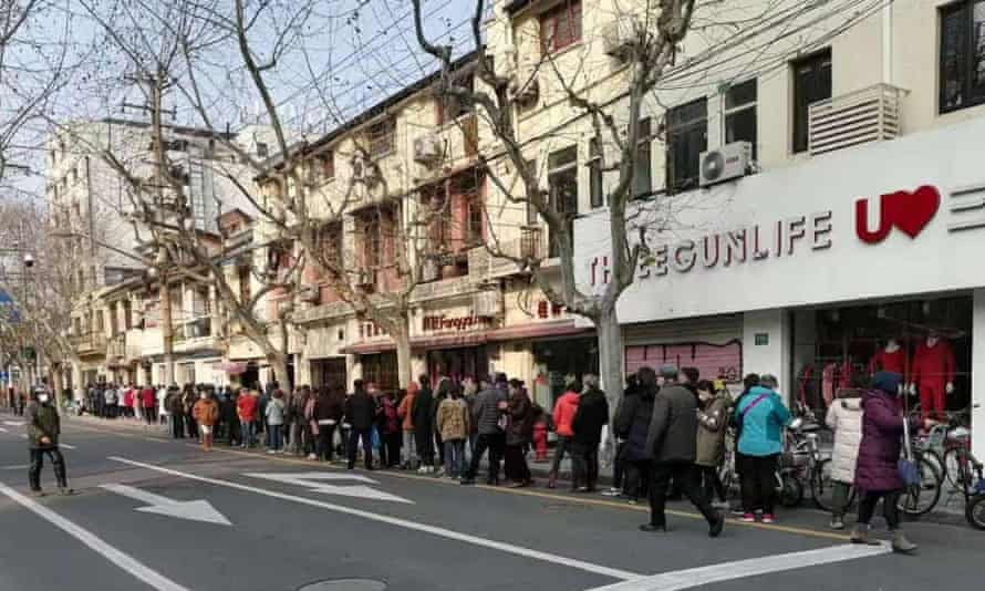 A long queue outside Three Gun Life, a clothing shop in Shanghai