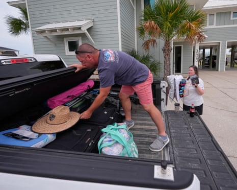 Daniel and Brand Harp, of Lebanon, Tennessee, are in Pensacola Beach on vacation. They are packing their belongings to leave before the hurricane makes landfall.