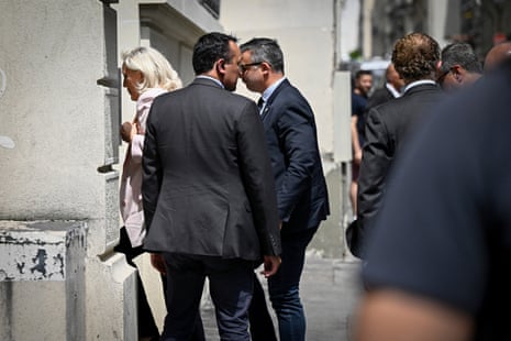 Marine Le Pen arrives at the party's new headquarters after being sentenced by the Paris Court of Appeal in the appeal trial.